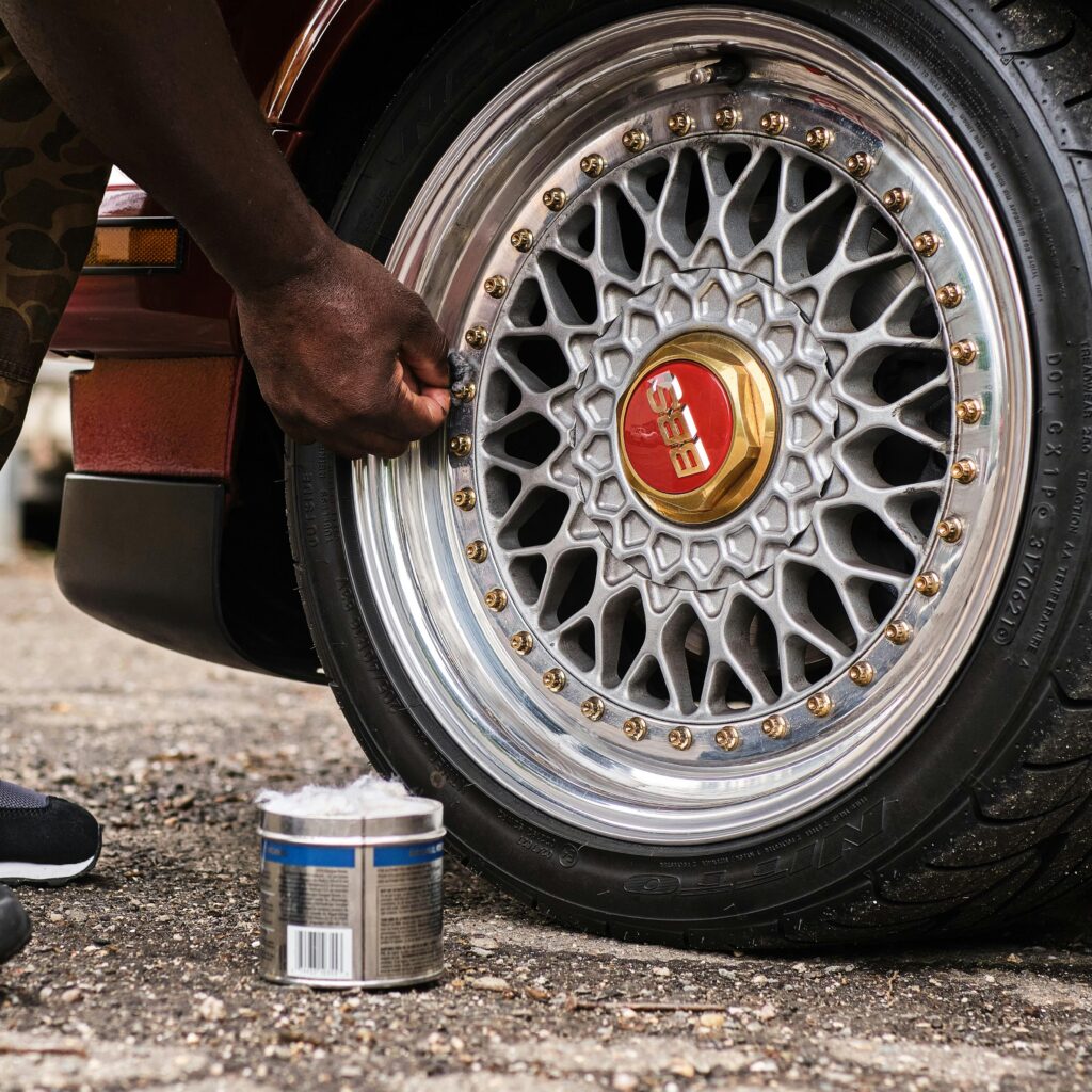 Close-up of Man Cleaning the Rim